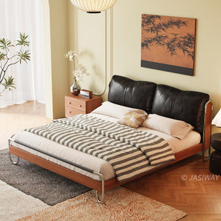 JASIWAY luxury minimalist platform bed with solid wood frame integrated with a curved chrome stainless steel tubular structure, featuring an ergonomic dual-pillow cushioned headboard upholstered in premium black leather, blending mid-century modern craftsmanship with industrial elegance, celebrated as the London Design Awards 2025 Silver Winner for master bedroom furniture design.-High-angle view