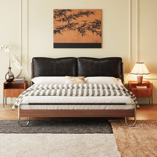 JASIWAY luxury minimalist platform bed with solid wood frame integrated with a curved chrome stainless steel tubular structure, featuring an ergonomic dual-pillow cushioned headboard upholstered in premium black leather, blending mid-century modern craftsmanship with industrial elegance, celebrated as the London Design Awards 2025 Silver Winner for master bedroom furniture design.-Front view