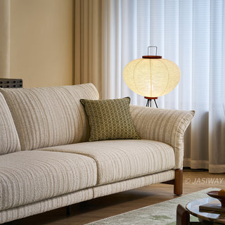 JASIWAY modern 3-seater sofa featuring a premium striped upholstery with deep-seated comfort, plush oversized cushions, flared armrests and solid wood legs in a dark walnut finish, showcasing a minimalist Japandi and organic modern aesthetic. -Diagonal medium shot