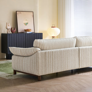 JASIWAY modern 3-seater sofa featuring a premium striped upholstery with deep-seated comfort, plush oversized cushions, flared armrests and solid wood legs in a dark walnut finish, showcasing a minimalist Japandi and organic modern aesthetic. -Rear view