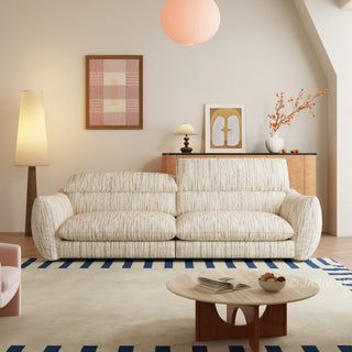 JASIWAY modern 3-seater sofa with striped upholstery, deep-seated cushions for enhanced comfort, and innovative adjustable headrests. This low-profile sofa is designed with a sleek, rounded silhouette and structured armrests, perfectly balancing contemporary aesthetics with ergonomic support for modern living spaces.-Front view