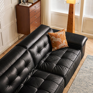 JASIWAY premium leather power reclining sleeper sofa featuring deep button-tufted backrests, adjustable panoramic headrests, and a unique open-concept recessed armrest with built-in storage, highlighting luxurious ergonomics, integrated technology, and space-saving functional furniture design for modern high-end homes.-High-angle view