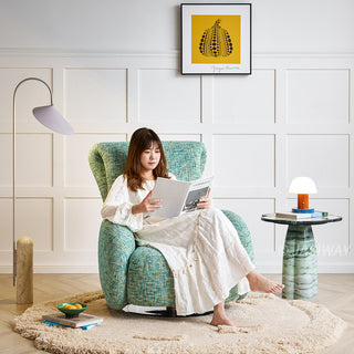 JASIWAY retro modern 360-degree swivel lounge chair featuring a sculptural curved silhouette and premium textured upholstery, showcasing a unique rounded backrest and barrel-style armrests, perfect as a stylish focal point for a contemporary living room, cozy bedroom nook, or executive study.-Three-quarter lifestyle view