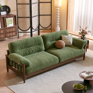 JASIWAY modern upholstered couch featuring a premium textured fabric over deeply tufted cushions, built on a sturdy mid-century walnut finish solid wood frame with exposed spindle arms, featuring a removable washable slipcover for an elegant yet functional living room seating solution.-High-angle view