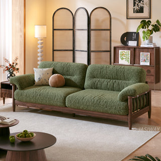 JASIWAY modern upholstered couch featuring a premium textured fabric over deeply tufted cushions, built on a sturdy mid-century walnut finish solid wood frame with exposed spindle arms, featuring a removable washable slipcover for an elegant yet functional living room seating solution.-Three quarter view