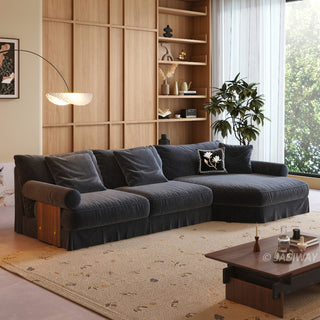 JASIWAY textured linen blend sofa, featuring a minimalist upholstery with a subtle linear weave, highlighting its plush, oversized bolsters and the architectural solid wood side panels, perfect for contemporary living rooms.-Three-quarter view