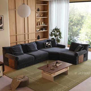 JASIWAY textured linen blend sofa, featuring a minimalist upholstery with a subtle linear weave, highlighting its plush, oversized bolsters and the architectural solid wood side panels, perfect for contemporary living rooms.-High-angle three-quarter view