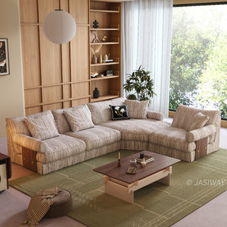 JASIWAY textured linen blend sofa, featuring a minimalist upholstery with a subtle linear weave, highlighting its plush, oversized bolsters and the architectural solid wood side panels, perfect for contemporary living rooms.-Three-quarter view