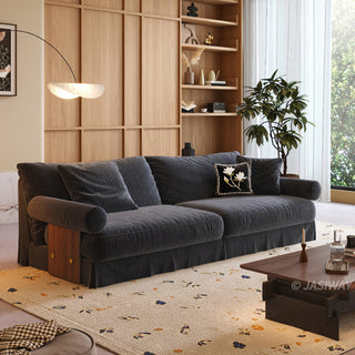 JASIWAY textured linen blend sofa, featuring a minimalist upholstery with a subtle linear weave, highlighting its plush, oversized bolsters and the architectural solid wood side panels, perfect for contemporary living rooms.-Three-quarter view