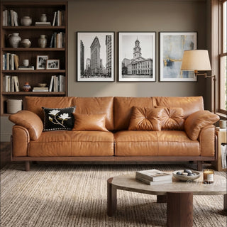 JASIWAY mid-century modern 3-seater sofa featuring premium top-grain leather upholstery with hand-stitched detailing, plush oversized armrests, and a sturdy solid wood exposed frame base in a walnut finish for a luxury living room aesthetic.-Front view