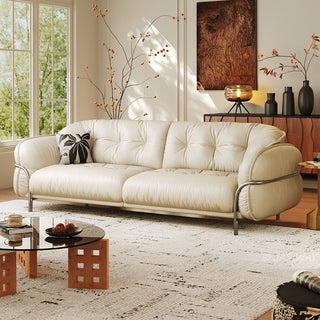 JASIWAY luxurious 3-seater modern couch featuring premium tufted genuine leather upholstery and a sleek wraparound sturdy frame, designed for contemporary living room aesthetics with deep-buttoned cushioning and ergonomic support.-Three-quarter view