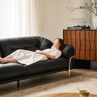 JASIWAY luxurious 3-seater modern couch featuring premium tufted genuine leather upholstery and a sleek wraparound sturdy frame, designed for contemporary living room aesthetics with deep-buttoned cushioning and ergonomic support.-Side view close-up