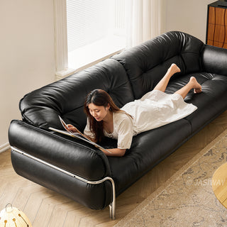 JASIWAY luxurious 3-seater modern couch featuring premium tufted genuine leather upholstery and a sleek wraparound sturdy frame, designed for contemporary living room aesthetics with deep-buttoned cushioning and ergonomic support.-High angle view