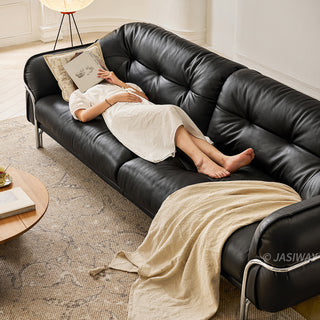 JASIWAY luxurious 3-seater modern couch featuring premium tufted genuine leather upholstery and a sleek wraparound sturdy frame, designed for contemporary living room aesthetics with deep-buttoned cushioning and ergonomic support.-High-angle view