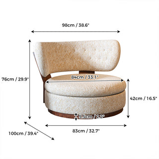 A technical product specification diagram outlines the dimensions of a rounded, upholstered armchair. Measurement arrows and text indicate an overall height of 29.9", width of 38.6", and depth of 39.4" cm. Additional callouts detail the seat width, seat height, and base clearance to provide exact sizing information.