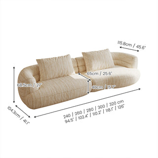 Dimension diagram of a modern curved beige textured fabric sofa with throw pillows, detailing seat height, depth, armrest height, and overall length options in inches and centimeters.