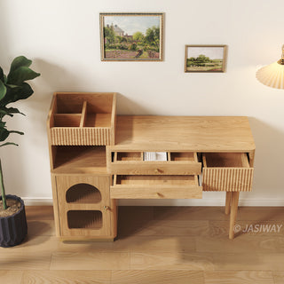 Angled lifestyle view of a modern wooden vanity desk with open drawer compartments and fluted storage in a warm bedroom setting.