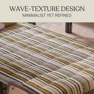 Close-up detail shot highlighting the wave-texture tufted design of a convertible accent chair mattress in olive green and cream striped fabric, featuring the text overlay "WAVE-TEXTURE DESIGN - MINIMALIST YET REFINED".
