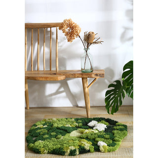RINGCHEN hand-tufted round area rug with a 3D forest moss design, featuring sculptural high-low pile in shades of deep emerald, sage green, and earthy grey to mimic a natural forest floor.-Straight-on accent shot
