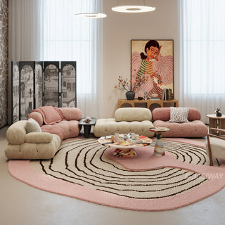 RINGCHEN petal pink and obsidian abstract round rug featuring a high-low tufted texture and organic circular ripples, showcases a hand-drawn tree ring motif with soft pink shaggy edges and crisp black line, blending modern minimalism with poetic visual storytelling.-Lifestyle view