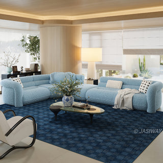 RINGCHEN modern cloud modular sectional sofa with a luxurious curved silhouette and light blue bouclé upholstery, featuring a modular design with high-density foam cushioning, rounded armrests, and a low-profile cloud-like aesthetic, perfect for high-end modern living room interiors and luxury home staging.-Diagonal view
