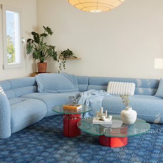 RINGCHEN modern cloud modular sectional sofa with a luxurious curved silhouette and light blue bouclé upholstery, featuring a modular design with high-density foam cushioning, rounded armrests, and a low-profile cloud-like aesthetic, perfect for high-end modern living room interiors and luxury home staging.-Diagonal view