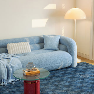 RINGCHEN modern cloud modular sectional sofa with a luxurious curved silhouette and light blue bouclé upholstery, featuring a modular design with high-density foam cushioning, rounded armrests, and a low-profile cloud-like aesthetic, perfect for high-end modern living room interiors and luxury home staging.-Medium shot