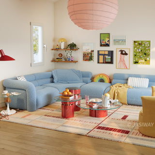 RINGCHEN modern cloud modular sectional sofa with a luxurious curved silhouette and light blue bouclé upholstery, featuring a modular design with high-density foam cushioning, rounded armrests, and a low-profile cloud-like aesthetic, perfect for high-end modern living room interiors and luxury home staging.-Diagonal view