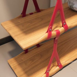 RINGCHEN modern sculptural bookshelf featuring organic-shaped solid wood shelves secured by avant-garde red Y-shaped structural supports, ideal for luxury living room curation and sculptural home decor displays.-Close-up view
