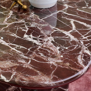 RINGCHEN modern minimalist oval dining table featuring a luxurious lava red marble and engineered solid wood, supported by unique sculptural legs with a high-gloss burgundy interior and matching marble exterior, perfect for elegant luxury dining room centerpieces.-Close-up of top texture