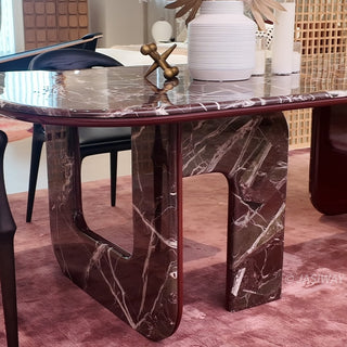 RINGCHEN modern minimalist oval dining table featuring a luxurious lava red marble and engineered solid wood, supported by unique sculptural legs with a high-gloss burgundy interior and matching marble exterior, perfect for elegant luxury dining room centerpieces.-Medium shot of legs