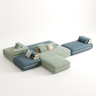 RINGCHEN modern modular cloud sofa with an ultra-low profile and deep-seated tofu block design, featuring a double-sided sectional configuration in a dual-material finish of premium sage green fabric and deep sea blue leather, showcased in a versatile, minimalist arrangement for spacious open-concept living rooms.-High-angle view
