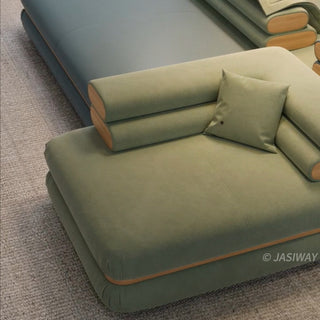 RINGCHEN modern modular cloud sofa with an ultra-low profile and deep-seated tofu block design, featuring a double-sided sectional configuration in a dual-material finish of premium sage green fabric and deep sea blue leather, showcased in a versatile, minimalist arrangement for spacious open-concept living rooms.-Close-up of fabric texture