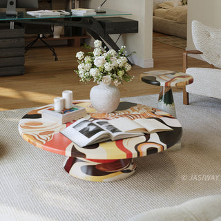 RINGCHEN organic modern 2-piece coffee table set featuring a sculptural round coffee table and matching tall side table with a vibrant, hand-painted abstract swirl pattern in warm earth tones, perfect as a functional art centerpiece for an upscale, eclectic, or avant-garde living room aesthetic.-High-angle view