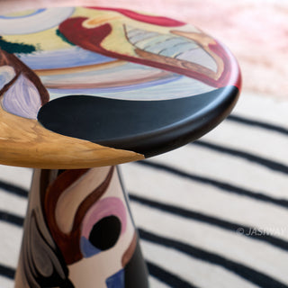 RINGCHEN organic modern 2-piece coffee table set featuring a sculptural round coffee table and matching tall side table with a vibrant, hand-painted abstract swirl pattern in warm earth tones, perfect as a functional art centerpiece for an upscale, eclectic, or avant-garde living room aesthetic.-Close-up of edge