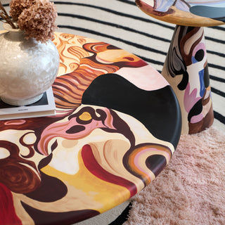 RINGCHEN organic modern 2-piece coffee table set featuring a sculptural round coffee table and matching tall side table with a vibrant, hand-painted abstract swirl pattern in warm earth tones, perfect as a functional art centerpiece for an upscale, eclectic, or avant-garde living room aesthetic.-Close-up of top texture