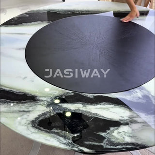 RINGCHEN luxury round dining table featuring a premium natural polished marble tabletop with dramatic dark veining, equipped with a seamless built-in rotating Lazy Susan, supported by a modern matte black conical pedestal base for high-end dining room decor.-Close-up