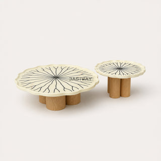 RINGCHEN sculptural lily pad coffee table set featuring irregular lotus leaf-shaped natural stone tops with intricate radial veining, supported by a cluster of solid wood pedestal bases. This luxury nesting coffee table set showcases a unique organic design with carved scalloped edges, blending artisanal craftsmanship with mid-century modern organic aesthetics for high-end designer living rooms.-Front view