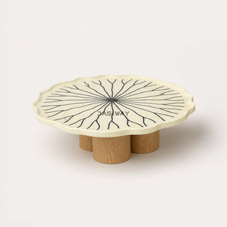 RINGCHEN sculptural lily pad coffee table set featuring irregular lotus leaf-shaped natural stone tops with intricate radial veining, supported by a cluster of solid wood pedestal bases. This luxury nesting coffee table set showcases a unique organic design with carved scalloped edges, blending artisanal craftsmanship with mid-century modern organic aesthetics for high-end designer living rooms.-Front view of low coffee table