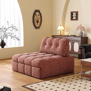 Modern tufted rust-red chenille accent chair in a warm, elegantly decorated living room interior