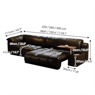 A dimensioned product drawing of a black leather sleeper sofa featuring channel tufting and a built-in swivel tray table, detailing overall widths ranging from 225 to 300 cm (88.6 to 118.1 inches) and other key measurements.